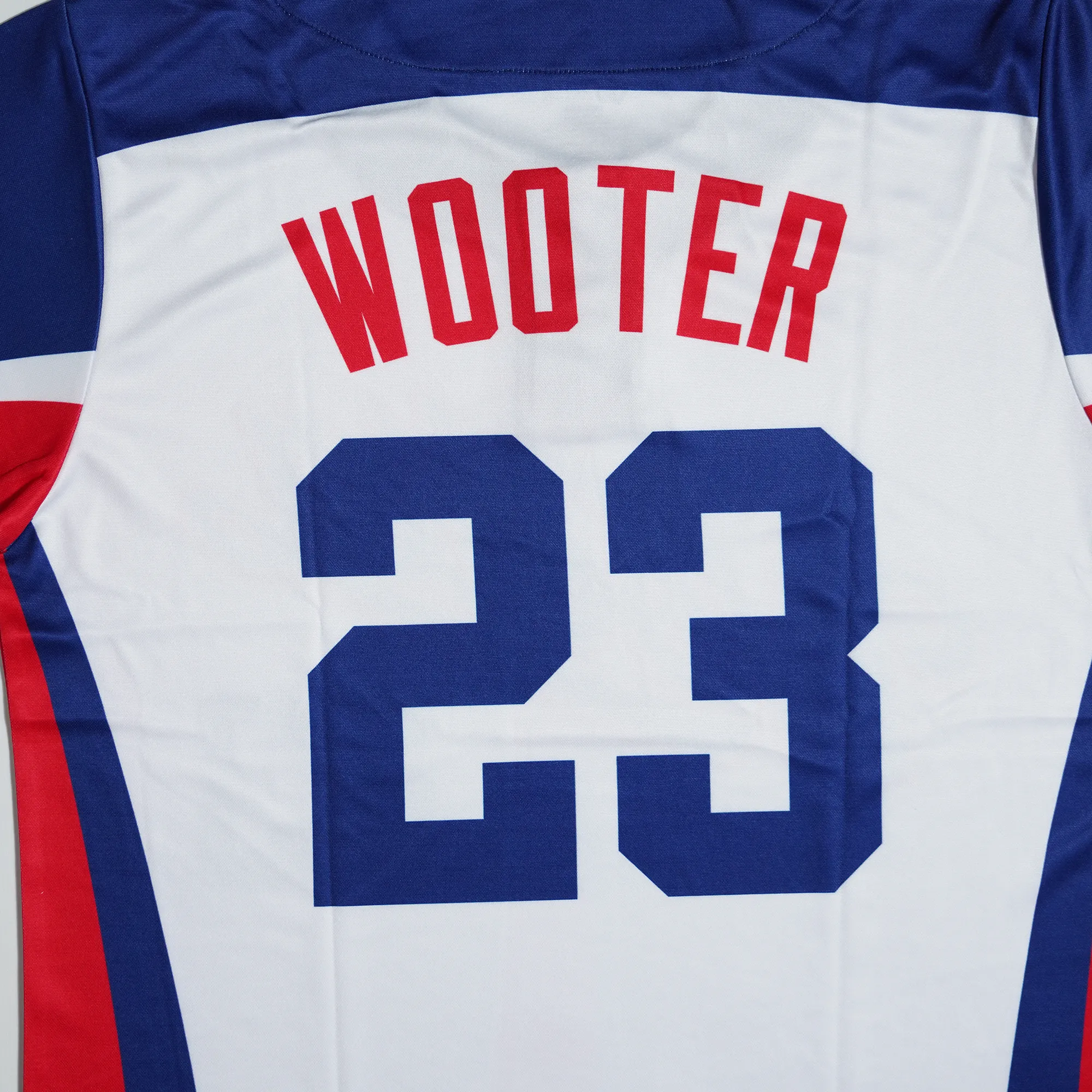 Closeup of Wooter Custom 2-Button Baseball Jerseys. View of Back